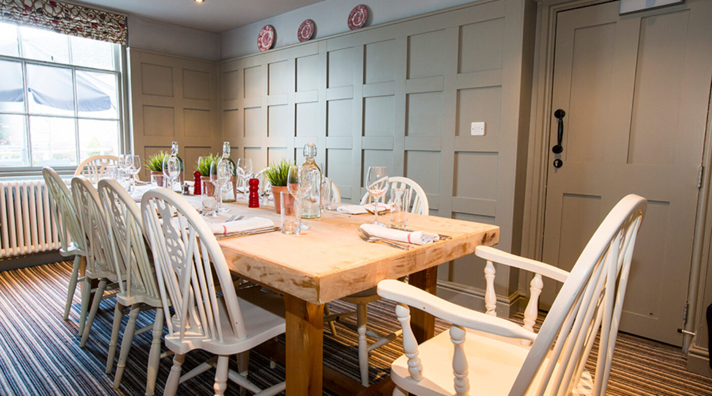 White chairs at a pub to rent in Dorset